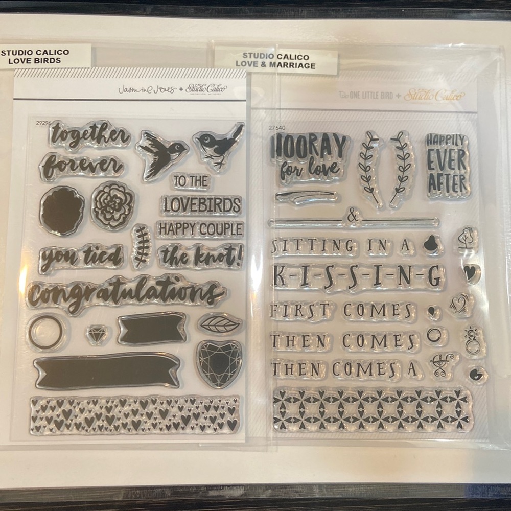 Two 4x6 studio calico stamp sets. “Love birds” and “love and marriage”